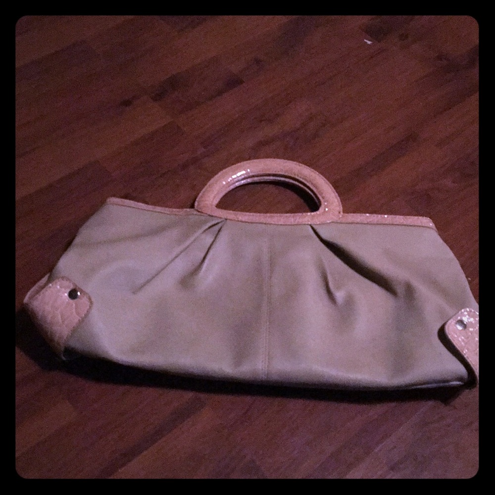 Lovely cream colored large clutch.